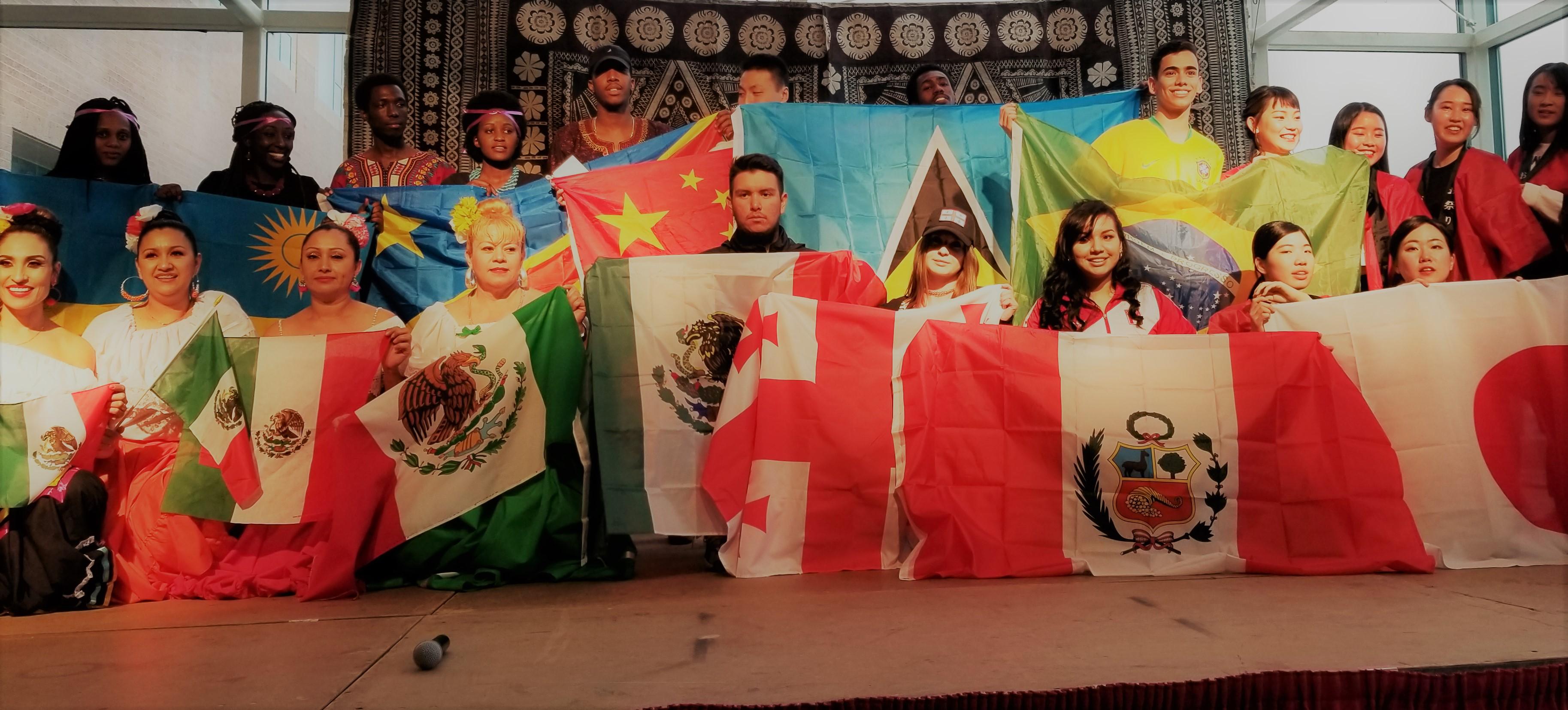 This is an image of students holding their country flags.