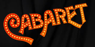 Cabaret sign in red with yellow circles