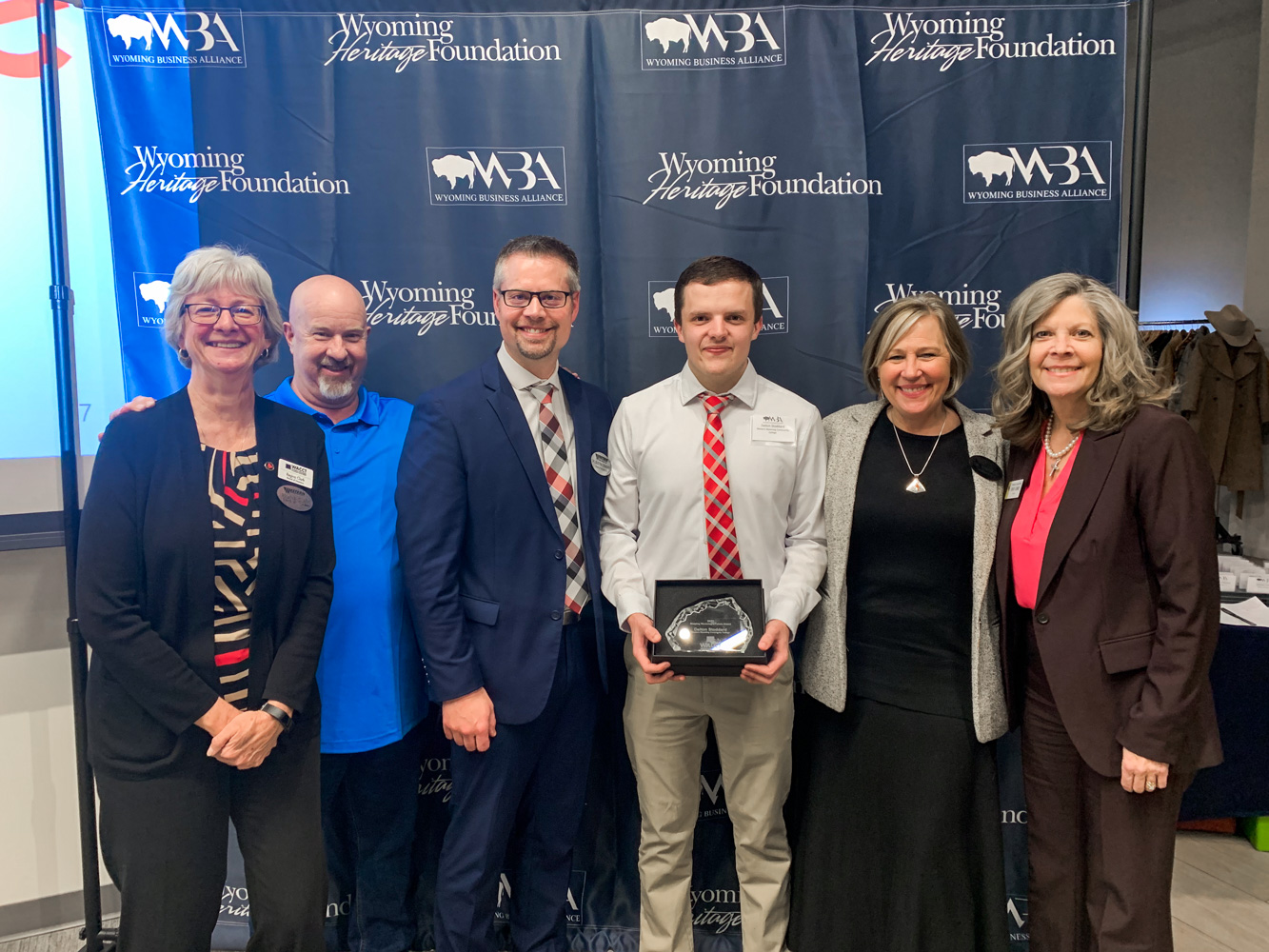 Pictured Left to Right: Western Board of Trustees Secretary, Regina Clark; Western Board of Trustees, Ron Wild; Western Dean of Students, Dr. Dustin Conover; Dalton Stoddard; Western College President, Dr. Kim Dale; and Sweetwater County Legislator, Stacy Jones