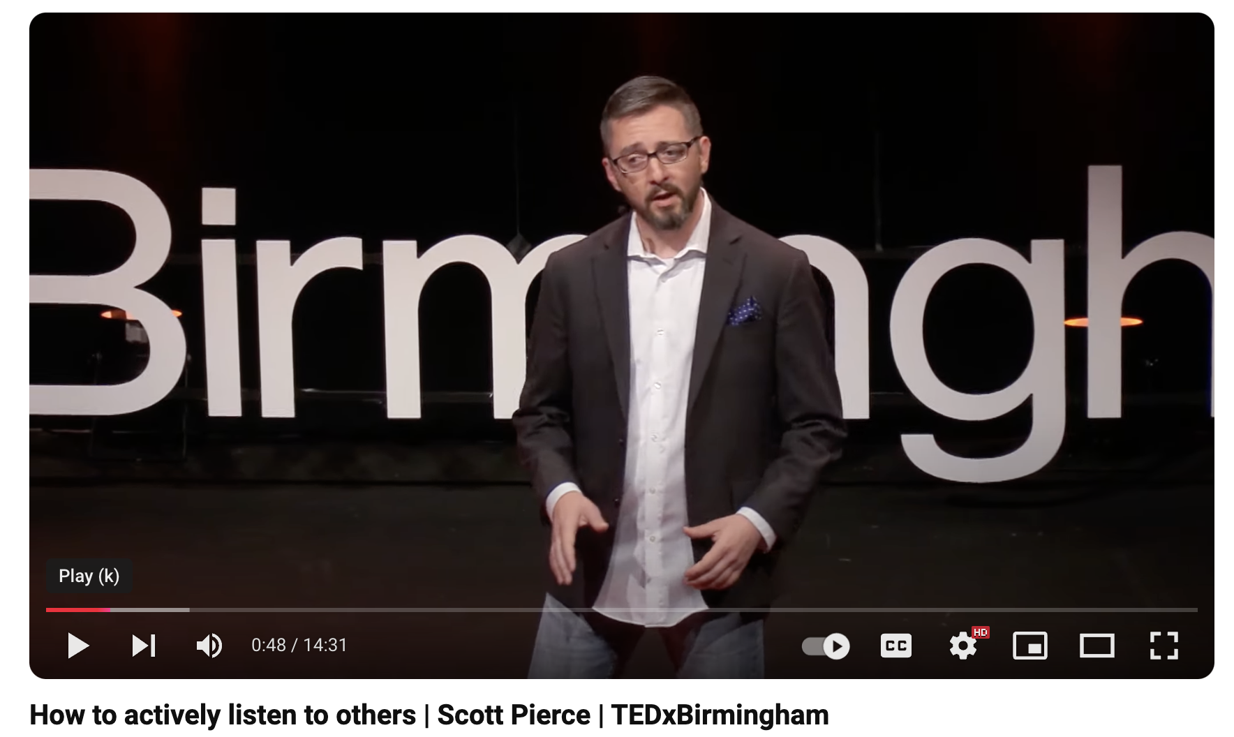 Ted Talk presenter Scott Pierce on stage in Birmingham Alabama